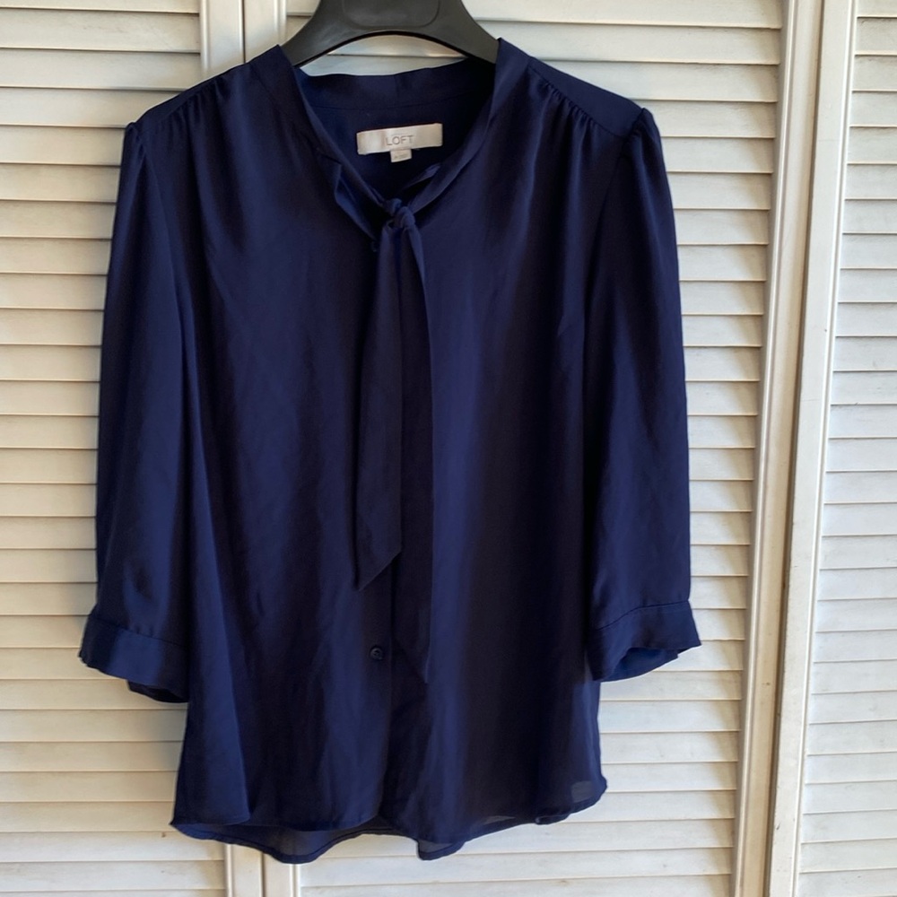 Loft size medium, navy blue blouse with three-quarter length sleeves
